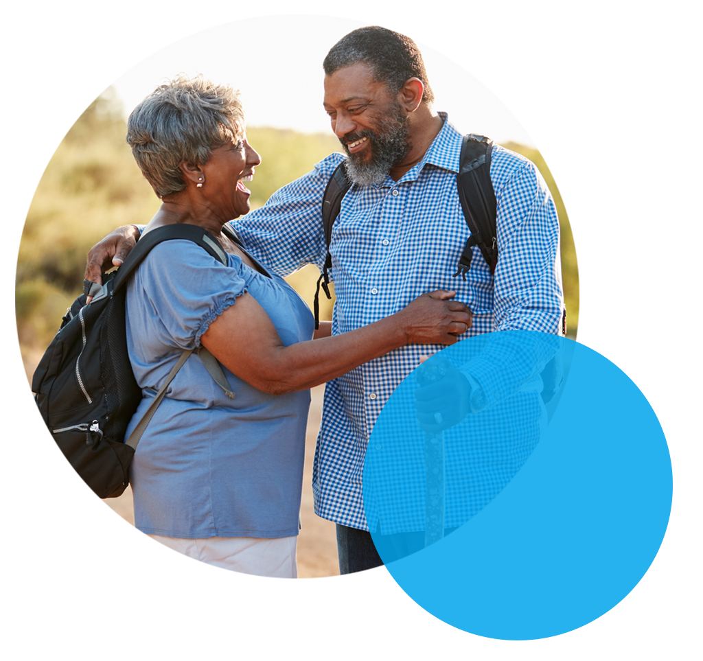 senior couple traveling with backpacks