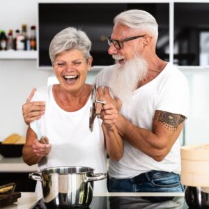 senior couple cooking together