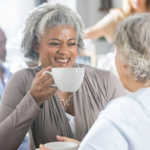 two women having coffee together