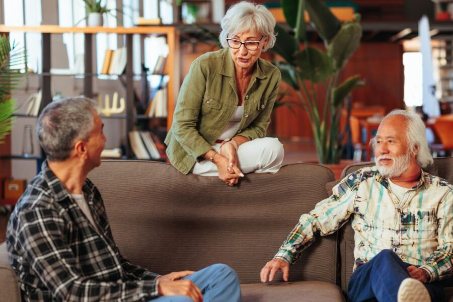 seniors on a couch at a 55+ living community in Elkhorn nebraska