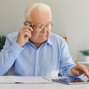 man looking through finances