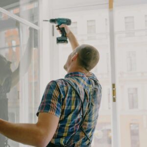 Maintenance person doing a repair