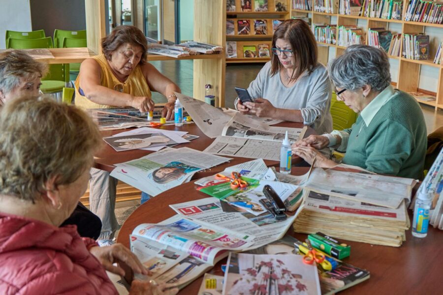 Seniors doing a photo collage together